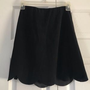 Black scalloped bottom faux suede mini skirt